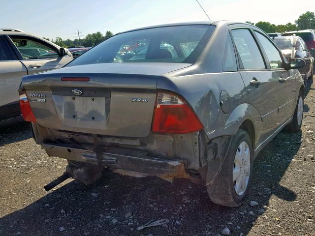 1FAFP34N86W172298 - 2006 FORD FOCUS ZX4 GRAY photo 4