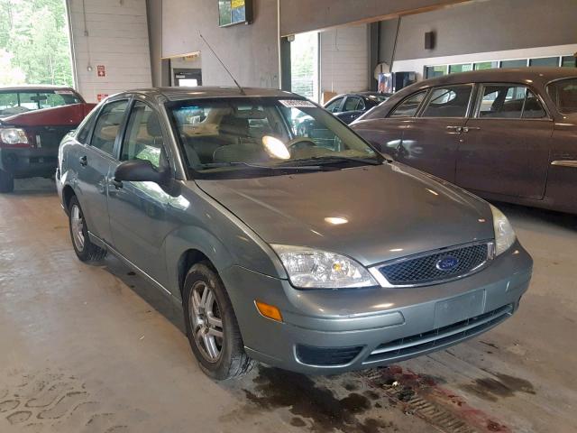 1FAHP34N66W153936 - 2006 FORD FOCUS ZX4 GRAY photo 1