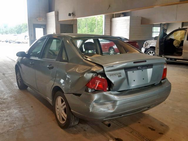 1FAHP34N66W153936 - 2006 FORD FOCUS ZX4 GRAY photo 3