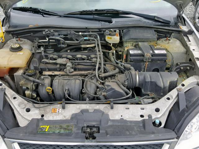 1FAFP34N27W134308 - 2007 FORD FOCUS ZX4 SILVER photo 7