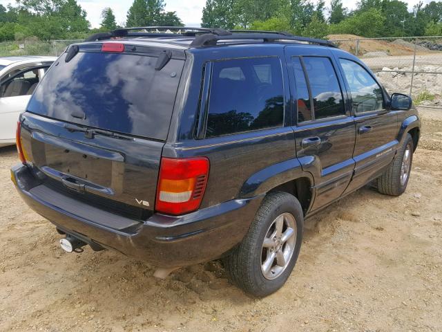 1J4GX58N84C143056 - 2004 JEEP GRAND CHER BLACK photo 4