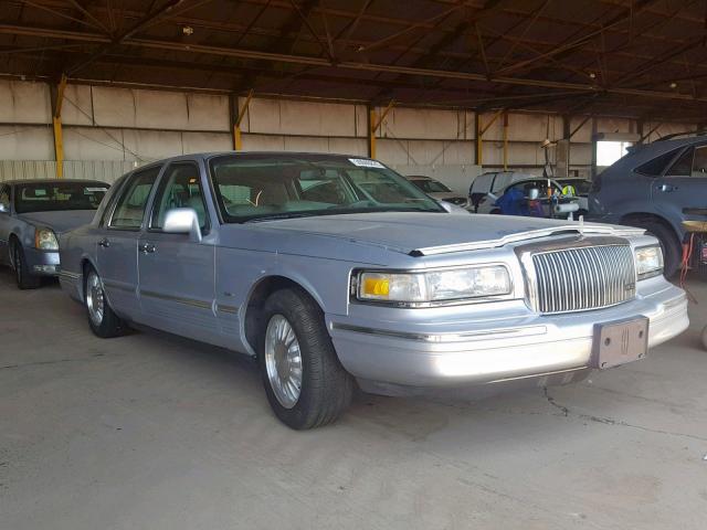 1LNLM83WXVY682048 - 1997 LINCOLN TOWN CAR C SILVER photo 1