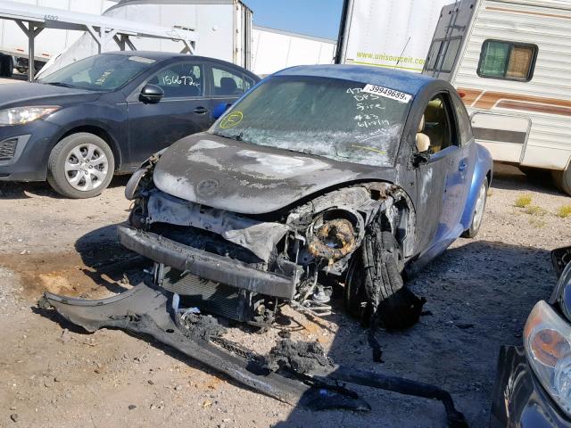 3VWCC21C0XM402615 - 1999 VOLKSWAGEN NEW BEETLE ლურჯი ფოტო 2