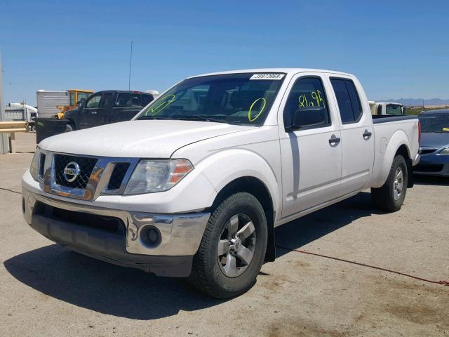 1N6AD09U79C427506 - 2009 NISSAN FRONTIER C WHITE photo 2