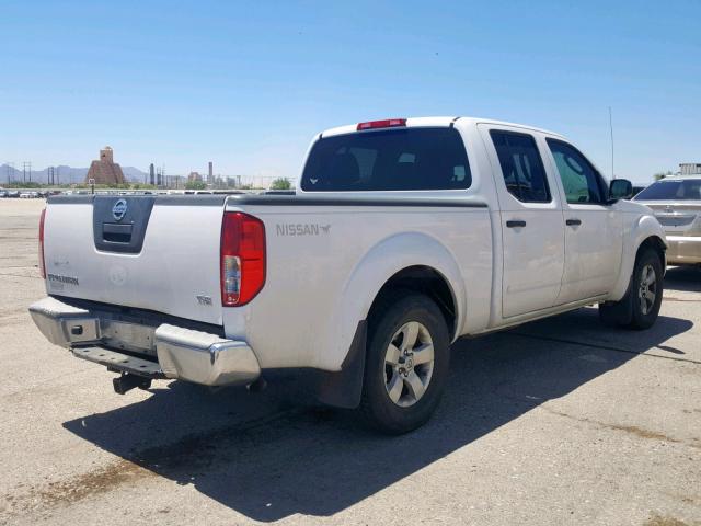 1N6AD09U79C427506 - 2009 NISSAN FRONTIER C WHITE photo 4