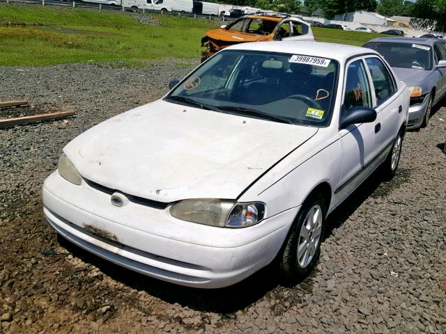 1Y1SK5284XZ416475 - 1999 CHEVROLET GEO PRIZM WHITE photo 2