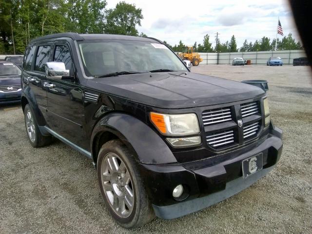 1D4PT4GKXBW599156 - 2011 DODGE NITRO HEAT BLACK photo 1