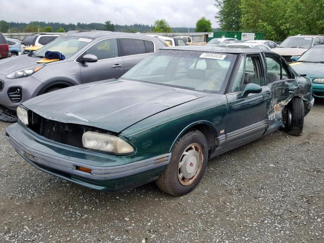 1G3HN52L4R4810634 - 1994 OLDSMOBILE 88 ROYALE GREEN photo 2