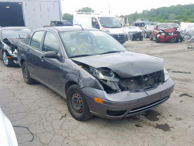 1FAFP34NX7W353422 - 2007 FORD FOCUS ZX4 GRAY photo 1