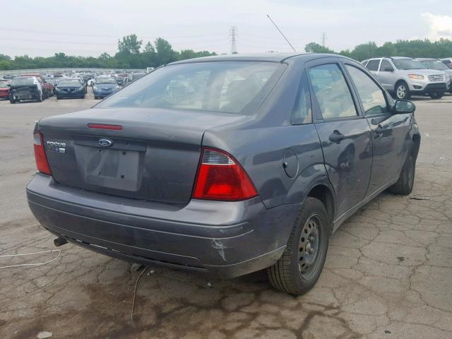 1FAFP34NX7W353422 - 2007 FORD FOCUS ZX4 GRAY photo 4