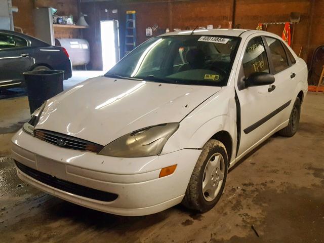 1FAFP33PX4W167992 - 2004 FORD FOCUS LX WHITE photo 2