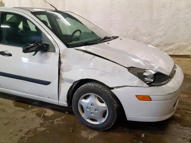 1FAFP33PX4W167992 - 2004 FORD FOCUS LX WHITE photo 9