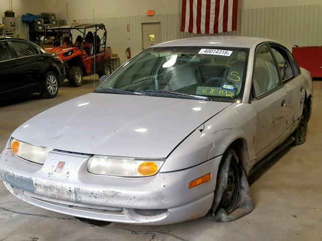 1G8ZG5283YZ188792 - 2000 SATURN SL1 SILVER photo 2