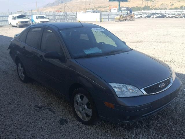 1FAHP34N95W314116 - 2005 FORD FOCUS ZX4 GRAY photo 1