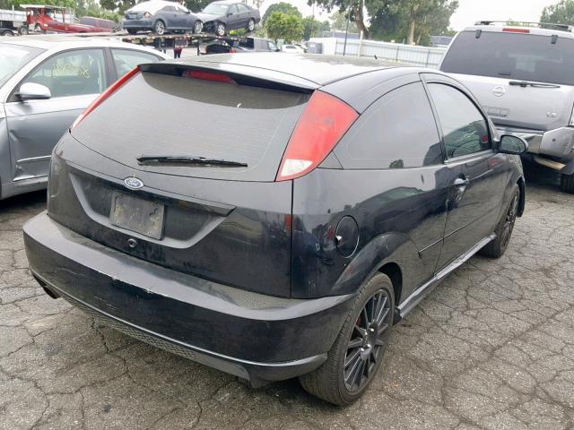 3FAHP39504R123212 - 2004 FORD FOCUS ZX3 BLACK photo 4