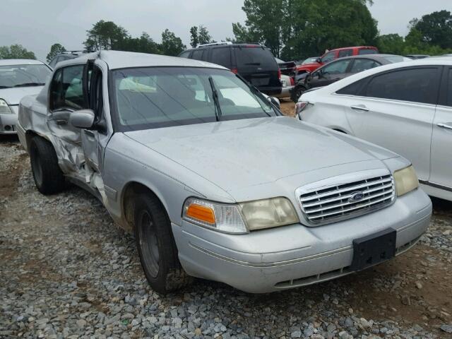 2FAFP71W7XX237376 - 1999 FORD CROWN VICT SILVER photo 1