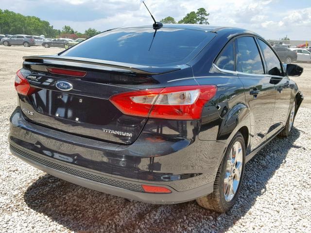 1FAHP3J29CL300340 - 2012 FORD FOCUS TITA BLACK photo 4