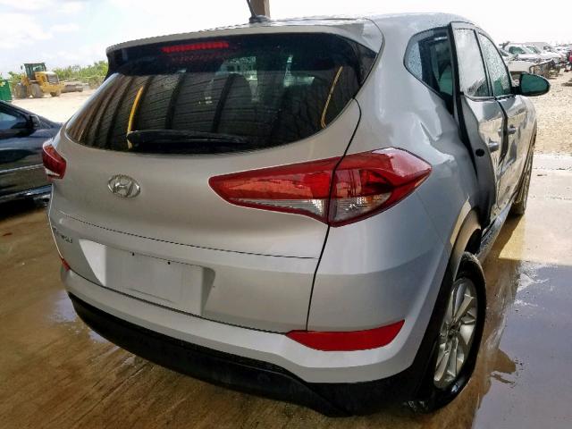 KM8J23A42GU202967 - 2016 HYUNDAI TUCSON SE GRAY photo 4