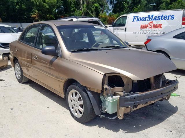 KNADC125546313097 - 2004 KIA RIO GOLD photo 1