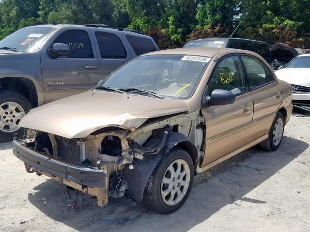 KNADC125546313097 - 2004 KIA RIO GOLD photo 2