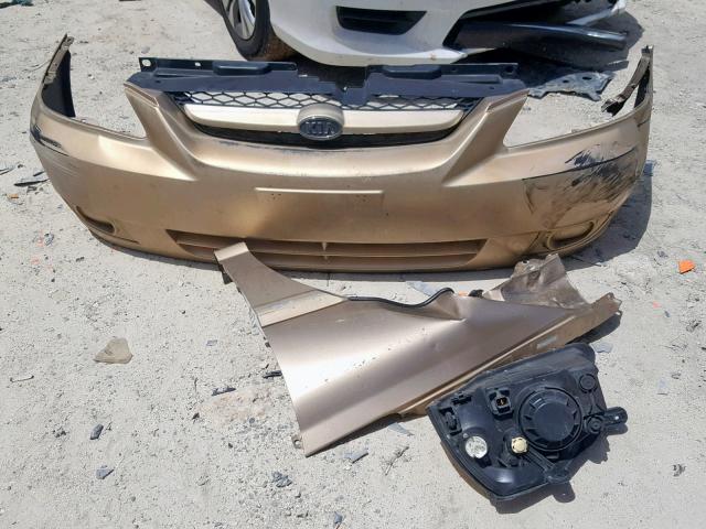 KNADC125546313097 - 2004 KIA RIO GOLD photo 9