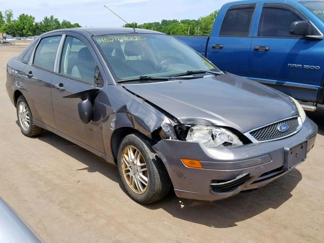 1FAHP34N97W287065 - 2007 FORD FOCUS ZX4 GRAY photo 1