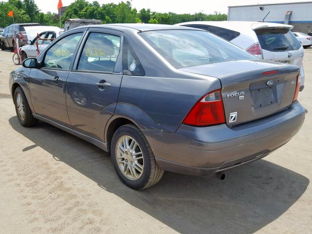 1FAHP34N97W287065 - 2007 FORD FOCUS ZX4 GRAY photo 3