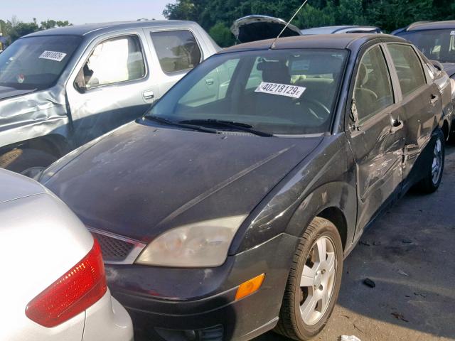 1FAFP34N35W184289 - 2005 FORD FOCUS ZX4 BLACK photo 2