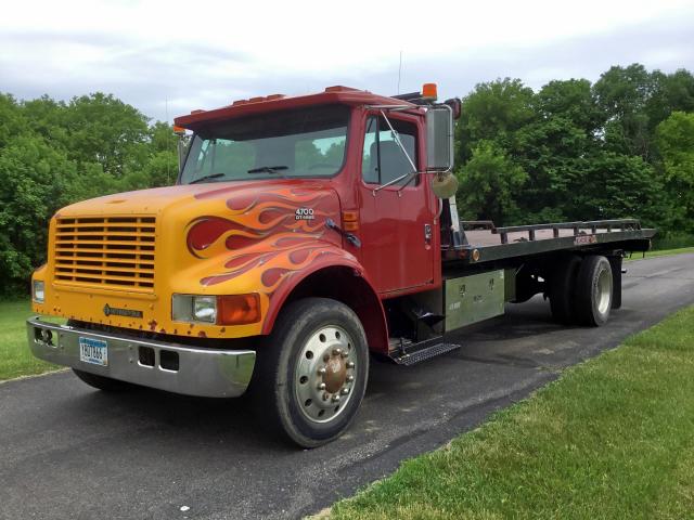 1HTSCAAM9XH222493 - 1999 INTERNATIONAL 4000 4700 RED photo 1