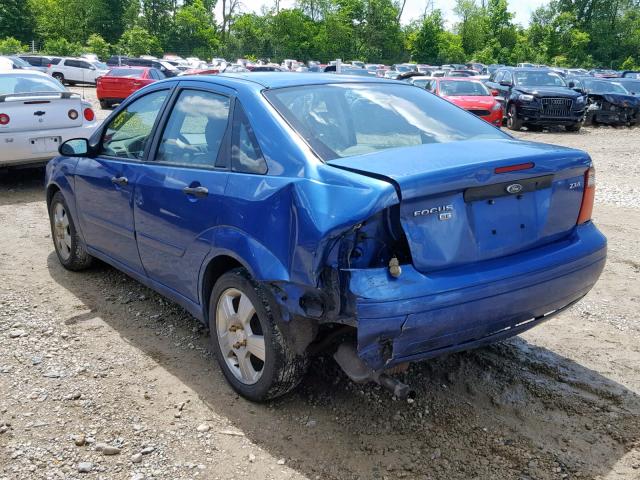 1FAFP34N25W288952 - 2005 FORD FOCUS ZX4 BLUE photo 9