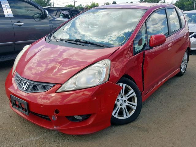 JHMGE8H4XAS003143 - 2010 HONDA FIT SPORT RED photo 2