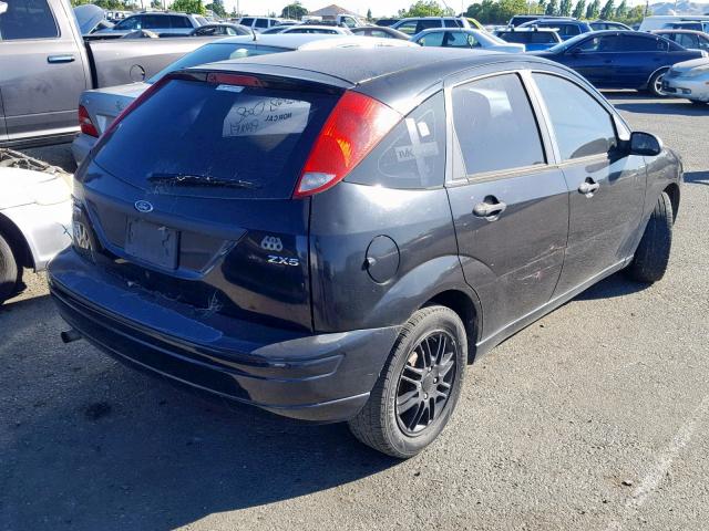 1FAFP37N76W149378 - 2006 FORD FOCUS ZX5 BLACK photo 4