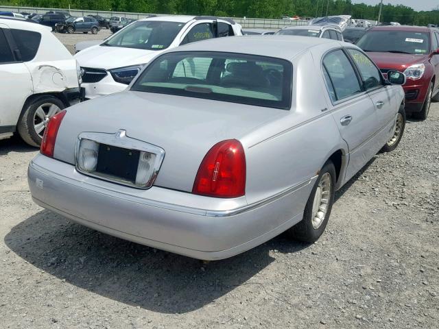 1LNHM81W1YY876075 - 2000 LINCOLN TOWN CAR E GRAY photo 4