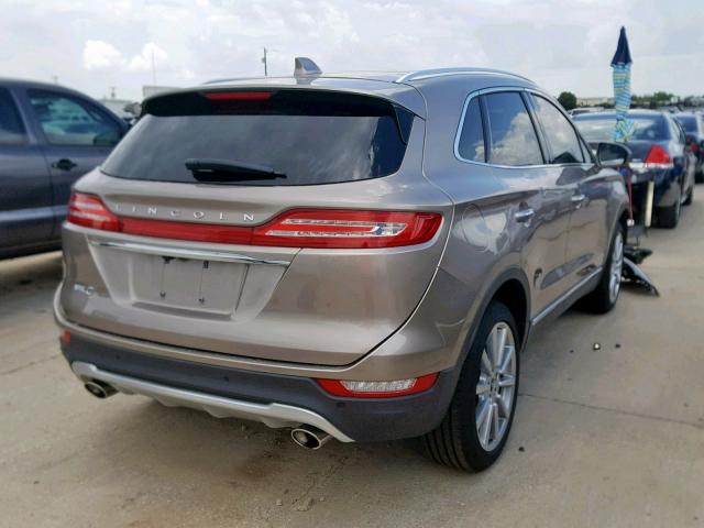 5LMCJ3C96KUL23169 - 2019 LINCOLN MKC RESERV GOLD photo 4