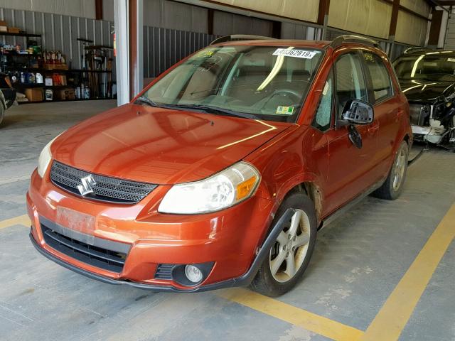 JS2YB417495101452 - 2009 SUZUKI SX4 TOURIN ORANGE photo 2