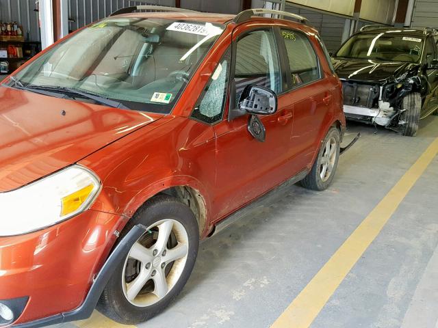 JS2YB417495101452 - 2009 SUZUKI SX4 TOURIN ORANGE photo 9