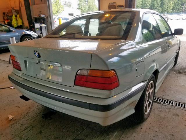 WBABF8337XEH63531 - 1999 BMW 323 IS AUT WHITE photo 4