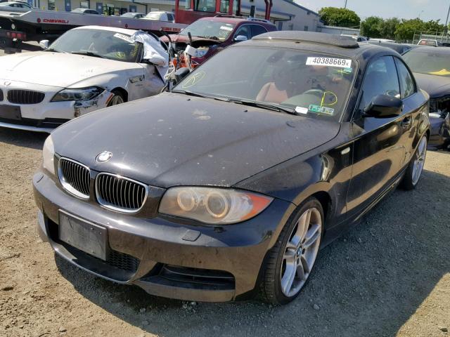 WBAUC9C59BVM11405 - 2011 BMW 135 I BLACK photo 2