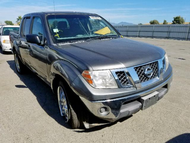 1N6AD07U19C410140 - 2009 NISSAN FRONTIER C GRAY photo 1