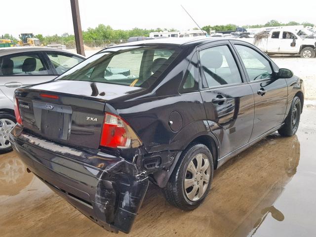 1FAFP34N65W225675 - 2005 FORD FOCUS ZX4 BLACK photo 4