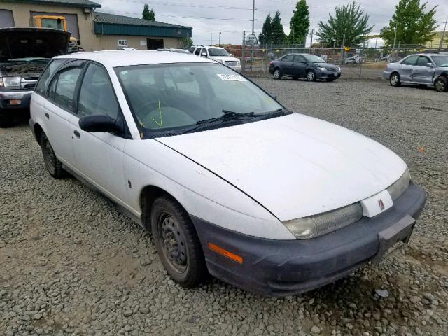 1G8ZM8286XZ177911 - 1999 SATURN SW1 POSTAL WHITE photo 1