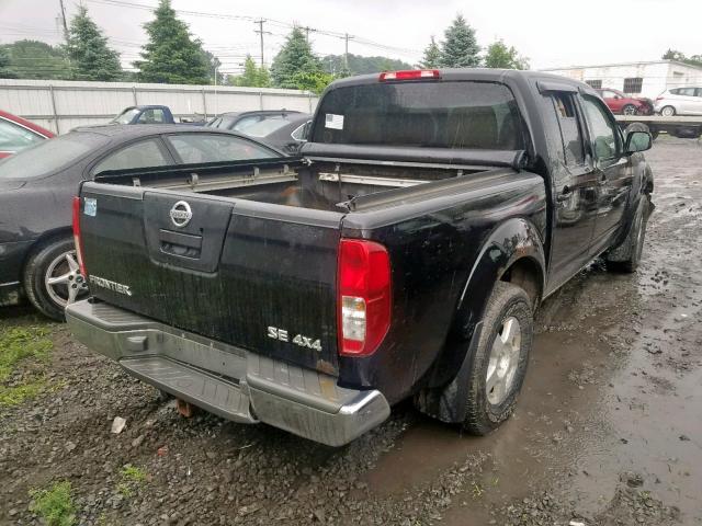 1N6AD07W06C435432 - 2006 NISSAN FRONTIER C BLACK photo 4