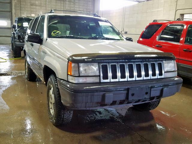 1J4GZ58YXSC643771 - 1995 JEEP GRAND CHER TAN photo 1