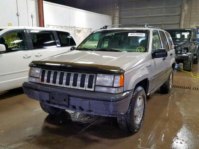 1J4GZ58YXSC643771 - 1995 JEEP GRAND CHER TAN photo 2