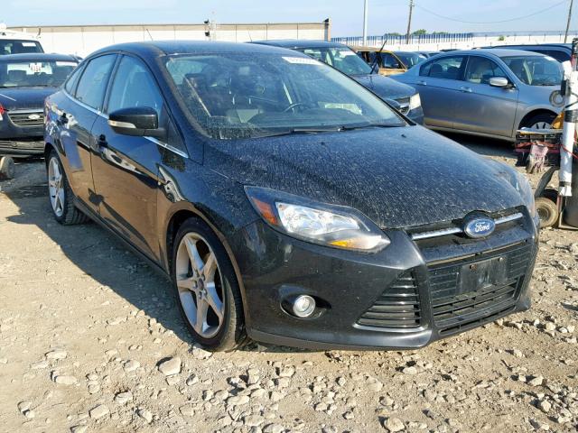 1FAHP3J23CL127527 - 2012 FORD FOCUS TITA BLACK photo 1