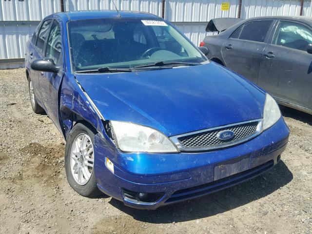 1FAFP34N65W211680 - 2005 FORD FOCUS ZX4 BLUE photo 1