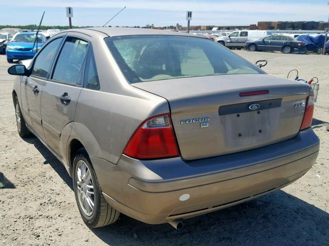 1FAFP34N25W147539 - 2005 FORD FOCUS ZX4 TAN photo 3