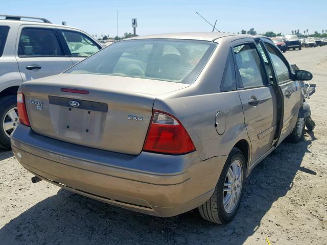 1FAFP34N25W147539 - 2005 FORD FOCUS ZX4 TAN photo 4