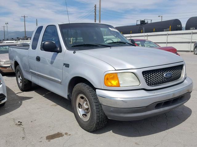 2FTRX17234CA70770 - 2004 FORD F-150 HERI GRAY photo 1