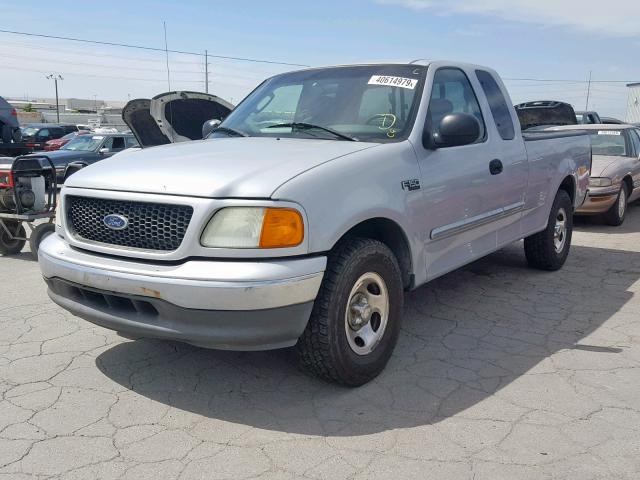 2FTRX17234CA70770 - 2004 FORD F-150 HERI GRAY photo 2